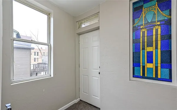 a view of an entryway with a window