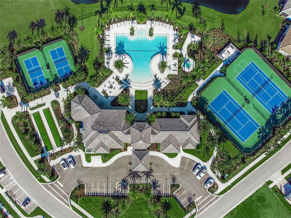 8605 Rain Song Road Sarasota, FL 34238 - Photo 31 of 52 an aerial view of a house with a yard and outdoor seating