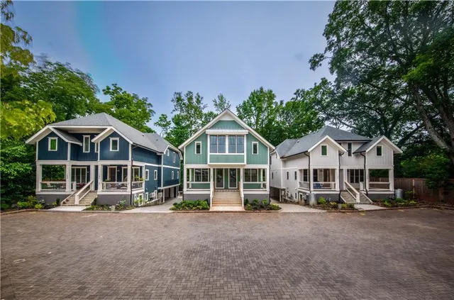a view of a street with cars