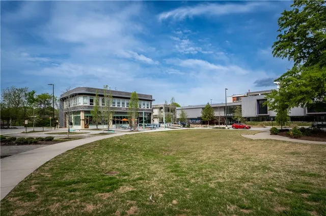 a view of the patio with outdoor seating