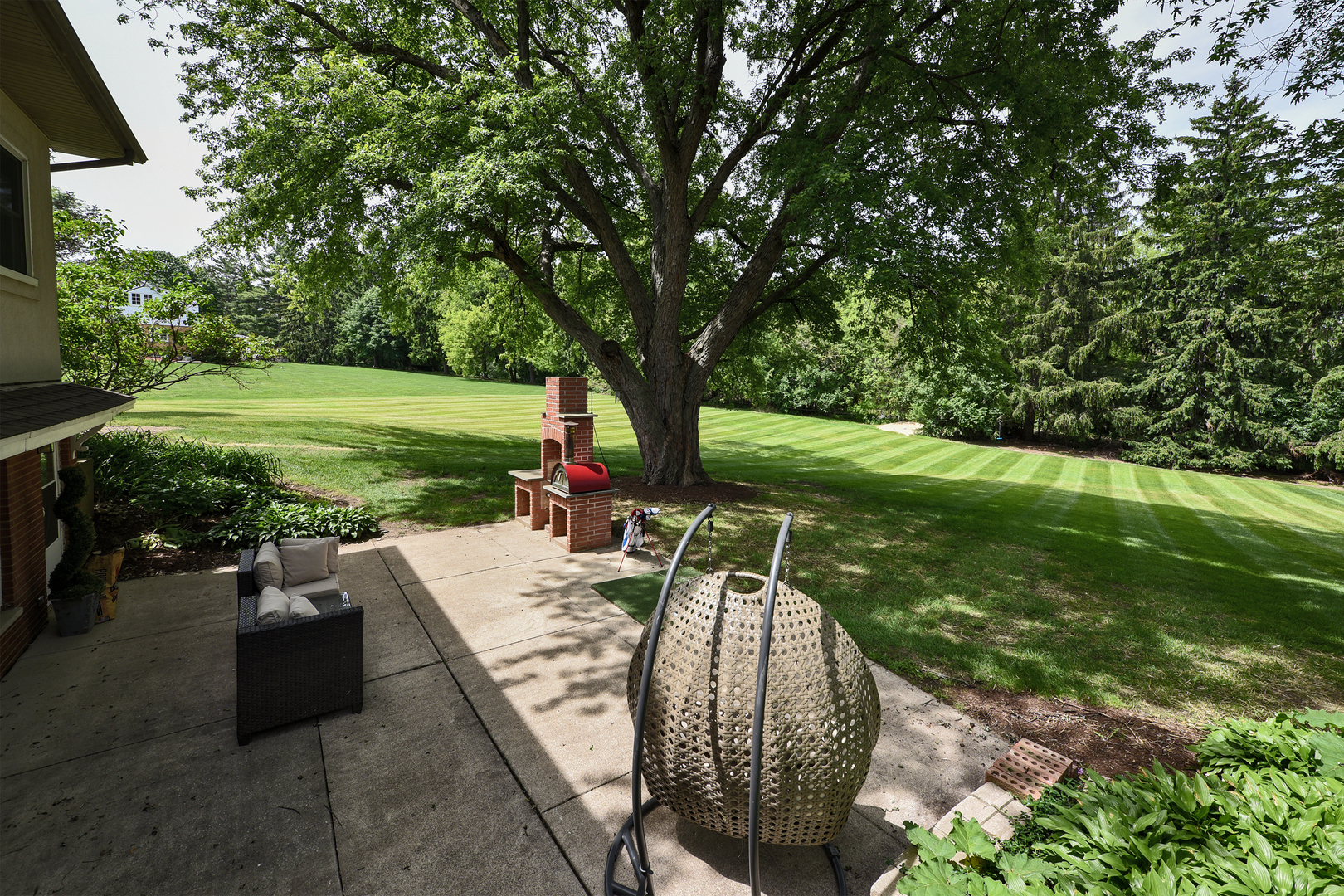 144 North Highland Road Inverness, IL 60067 - Photo 39 of 49 a view of a backyard with sitting area