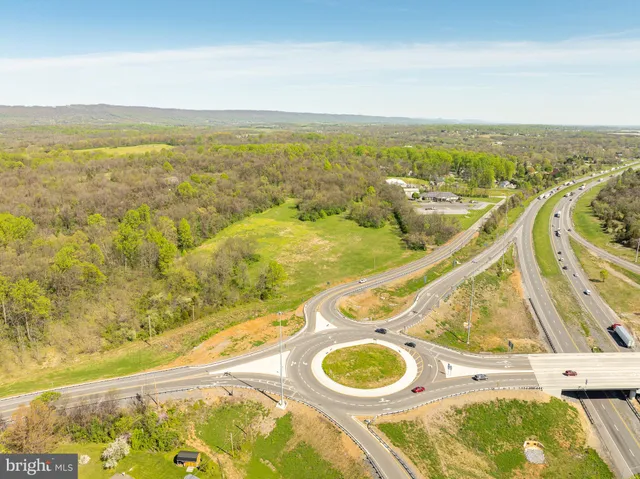 a view of a swimming pool with an ocean view