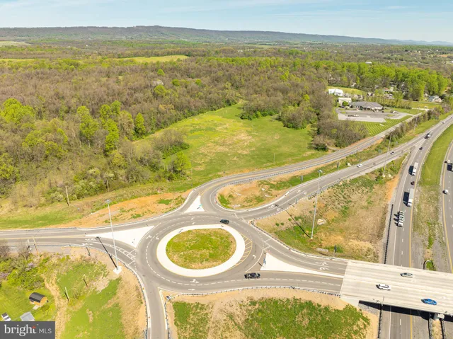 a view of a swimming pool with an ocean view