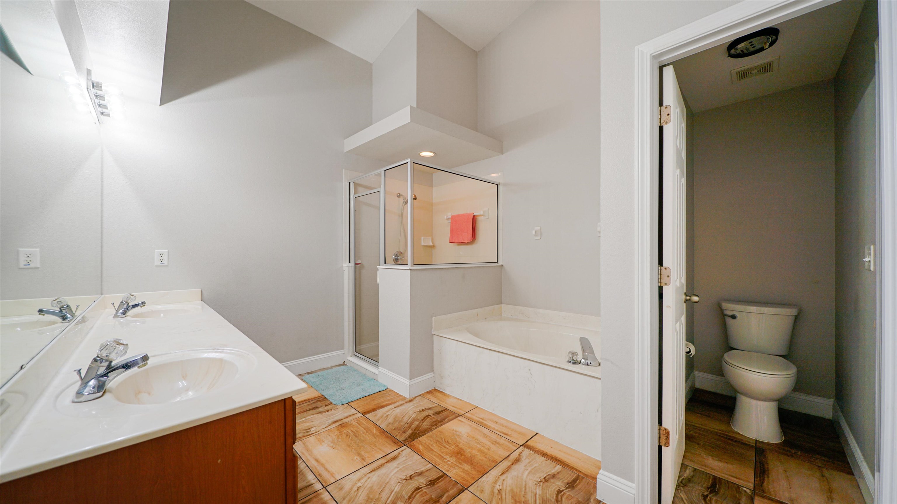617 Birchbark Trail St. Augustine, FL 32092 - Photo 15 of 41 a en suite bathroom with a sink and a mirror
