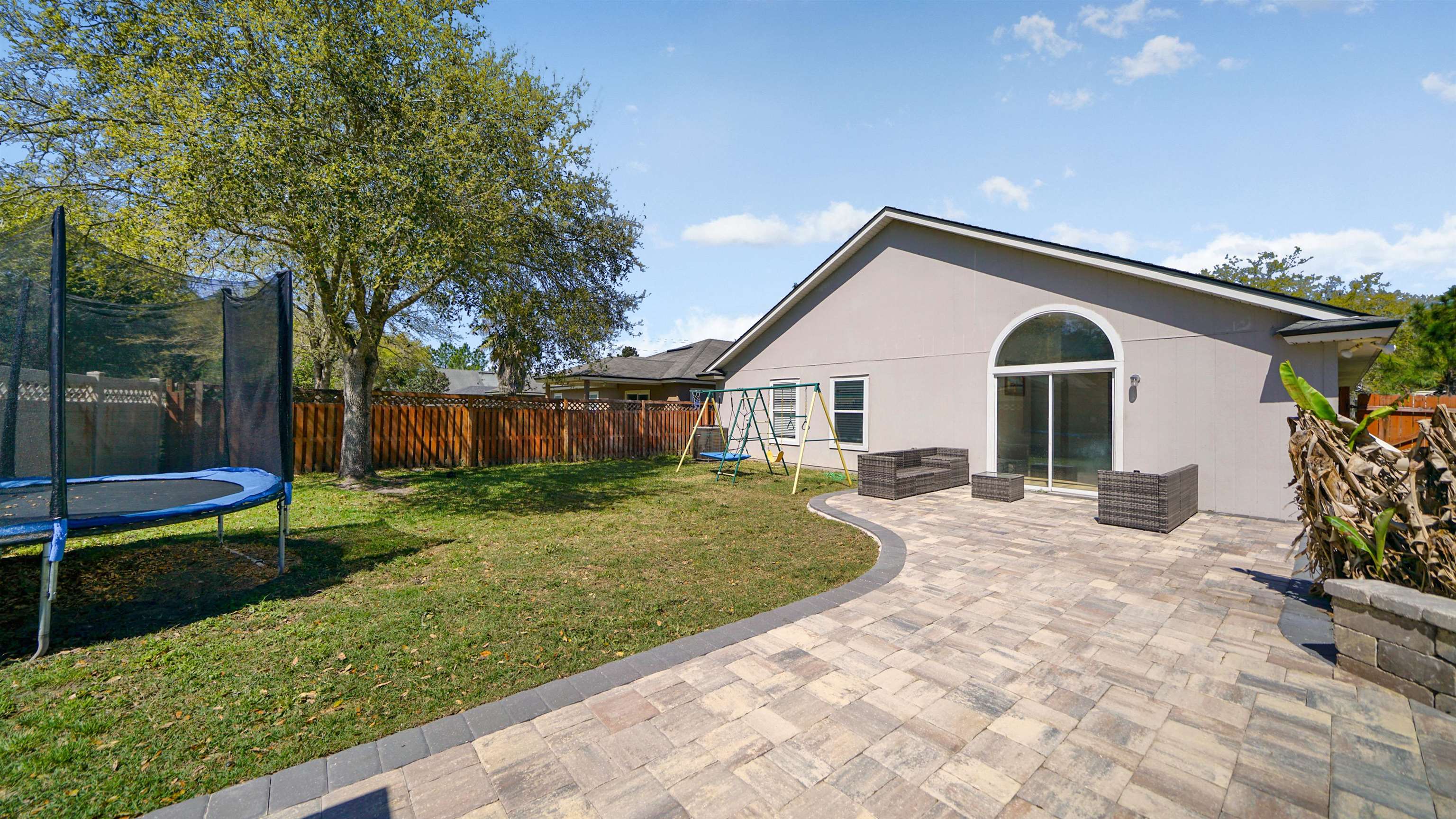 617 Birchbark Trail St. Augustine, FL 32092 - Photo 23 of 41 a view of a house with backyard and sitting area