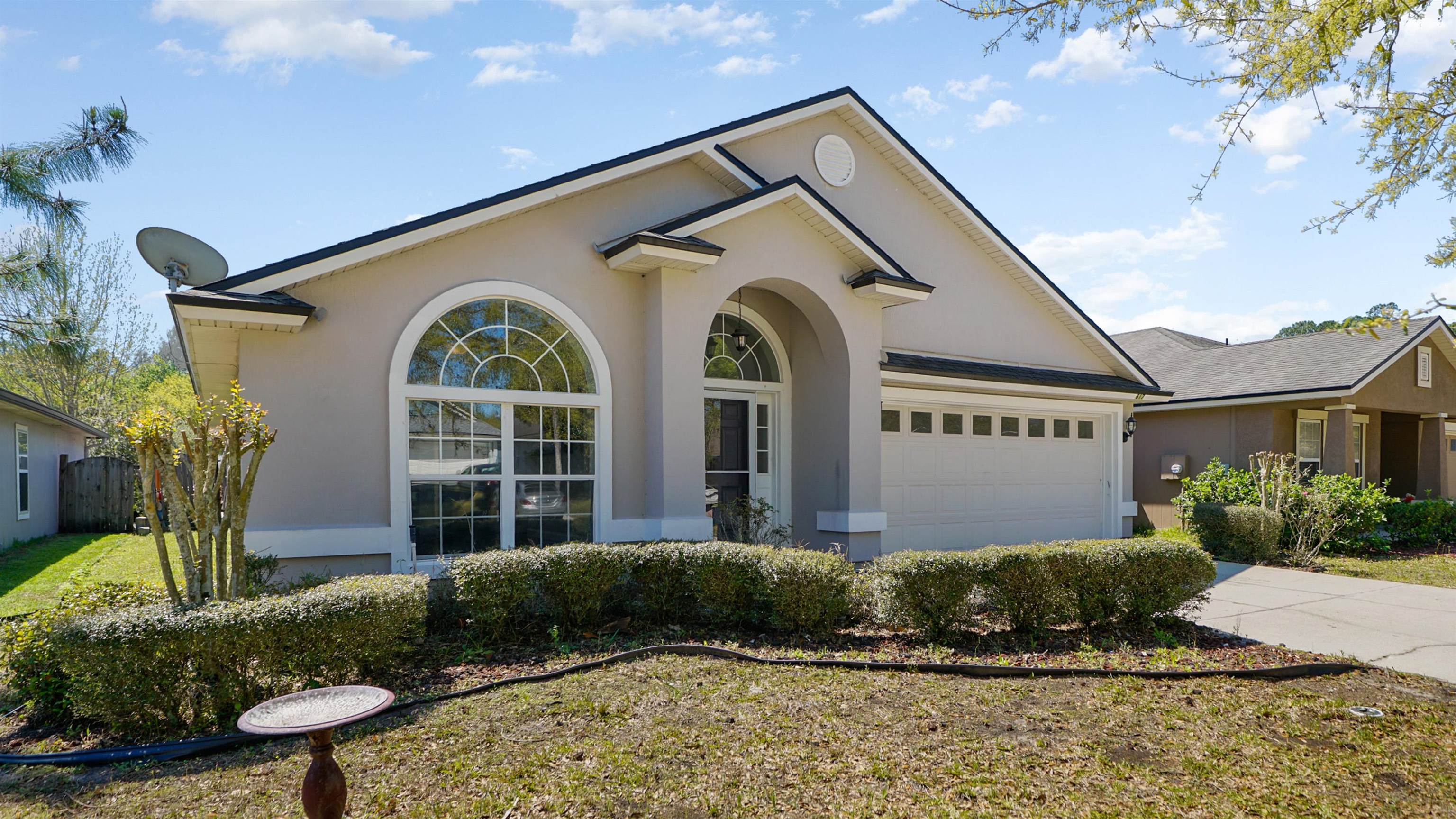 617 Birchbark Trail St. Augustine, FL 32092 - Photo 27 of 41 a front view of a house with garden