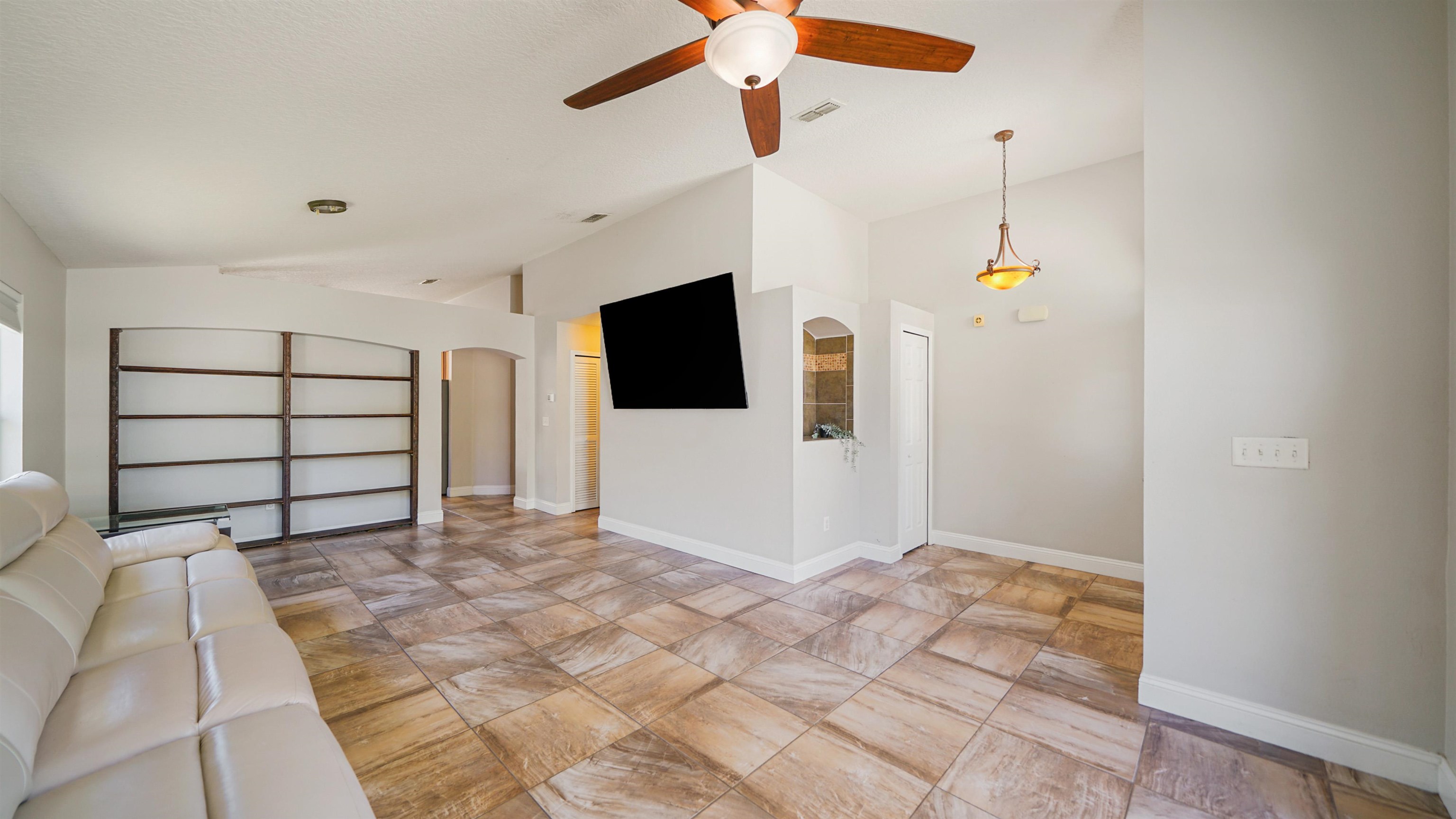 617 Birchbark Trail St. Augustine, FL 32092 - Photo 3 of 41 a view of a livingroom with a flat screen tv