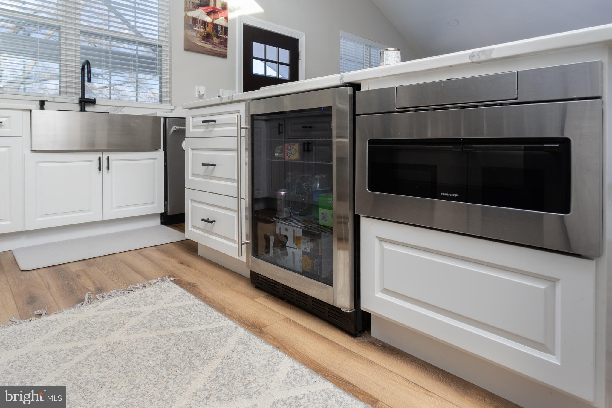 282 Juliustown Road Columbus, NJ 08022 - Photo 11 of 37 a kitchen with stainless steel appliances a stove microwave and sink