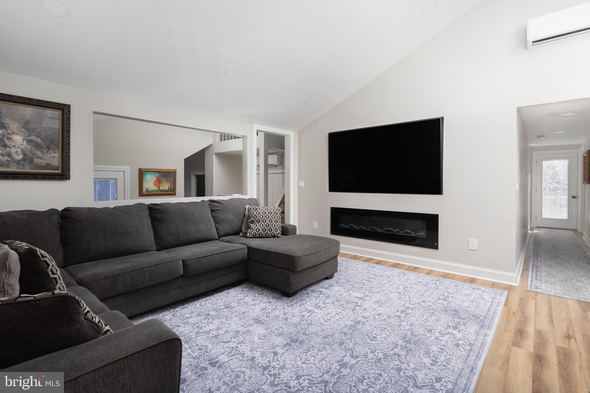 282 Juliustown Road Columbus, NJ 08022 - Photo 14 of 37 a living room with couches and a flat screen tv