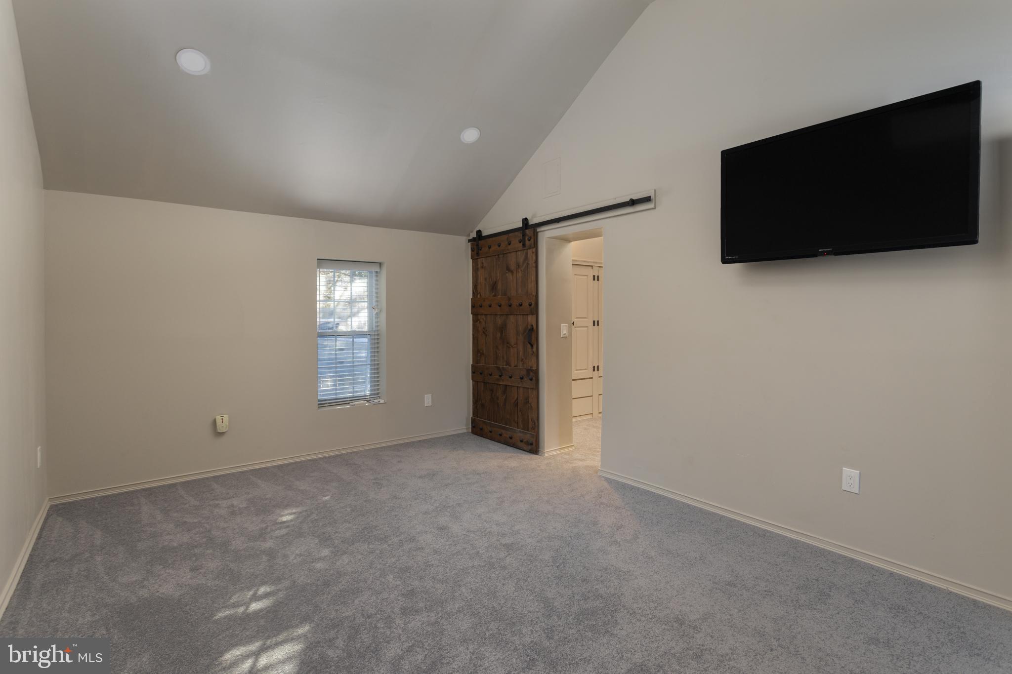 282 Juliustown Road Columbus, NJ 08022 - Photo 20 of 37 a view of a livingroom with a flat screen tv and windows