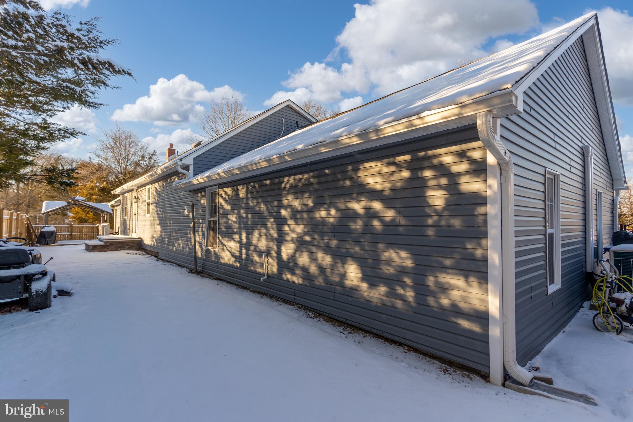 282 Juliustown Road Columbus, NJ 08022 - Photo 32 of 37 a view of a porch with a bench