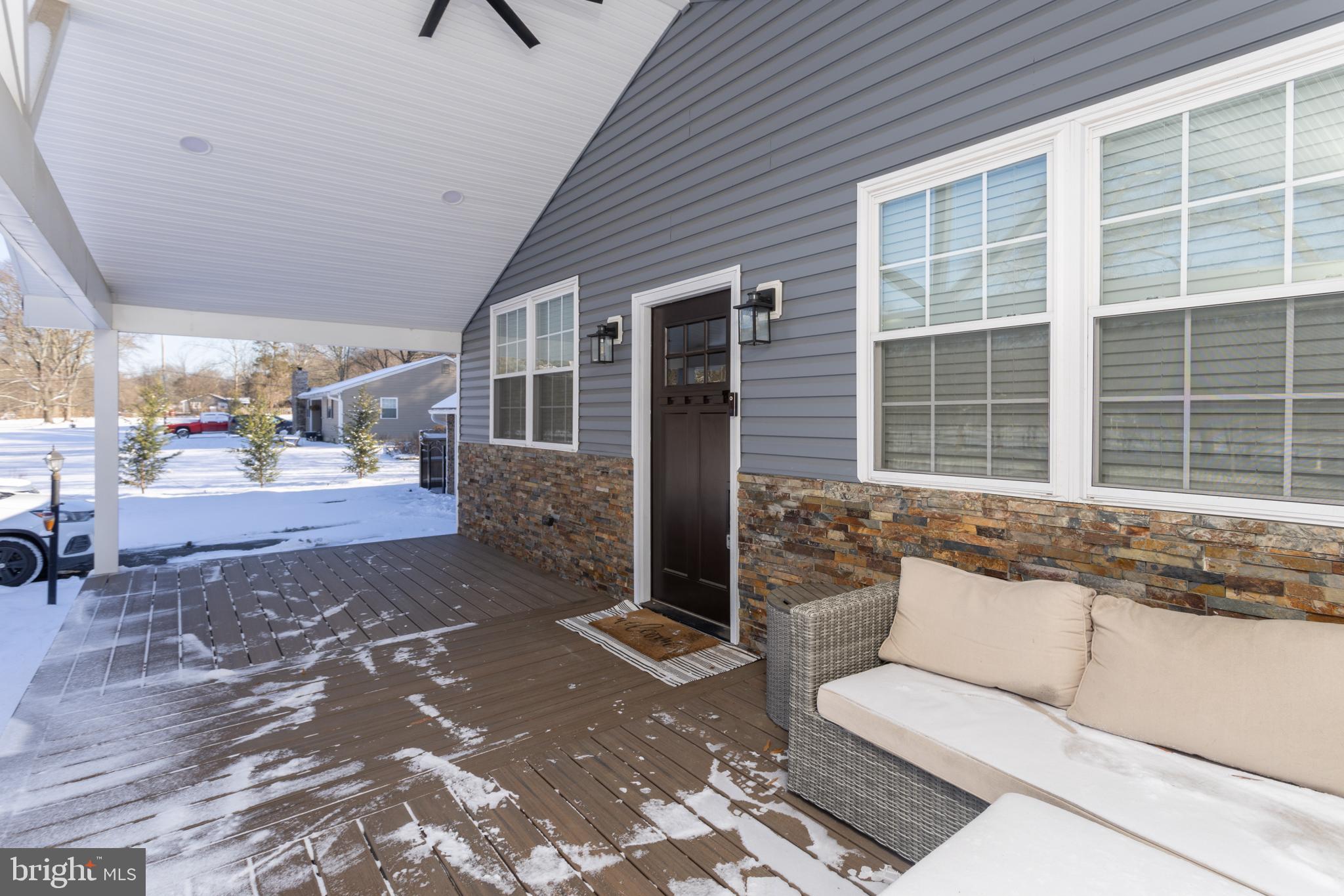 282 Juliustown Road Columbus, NJ 08022 - Photo 6 of 37 a view of a porch with couches and potted plants