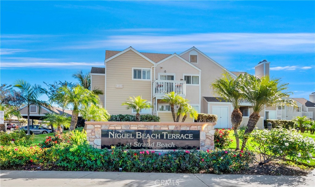 34110 Selva Road, Unit 323 Dana Point, CA 92629 - Photo 10 of 16 a front view of a house with a yard