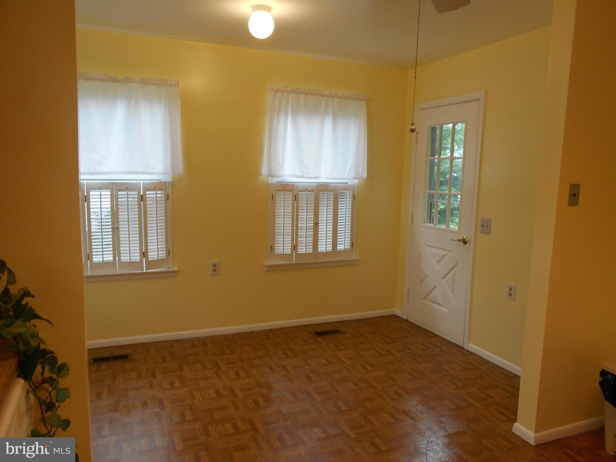 7048 Catalpa Road Frederick, MD 21703 - Photo 13 of 26 an empty room with windows