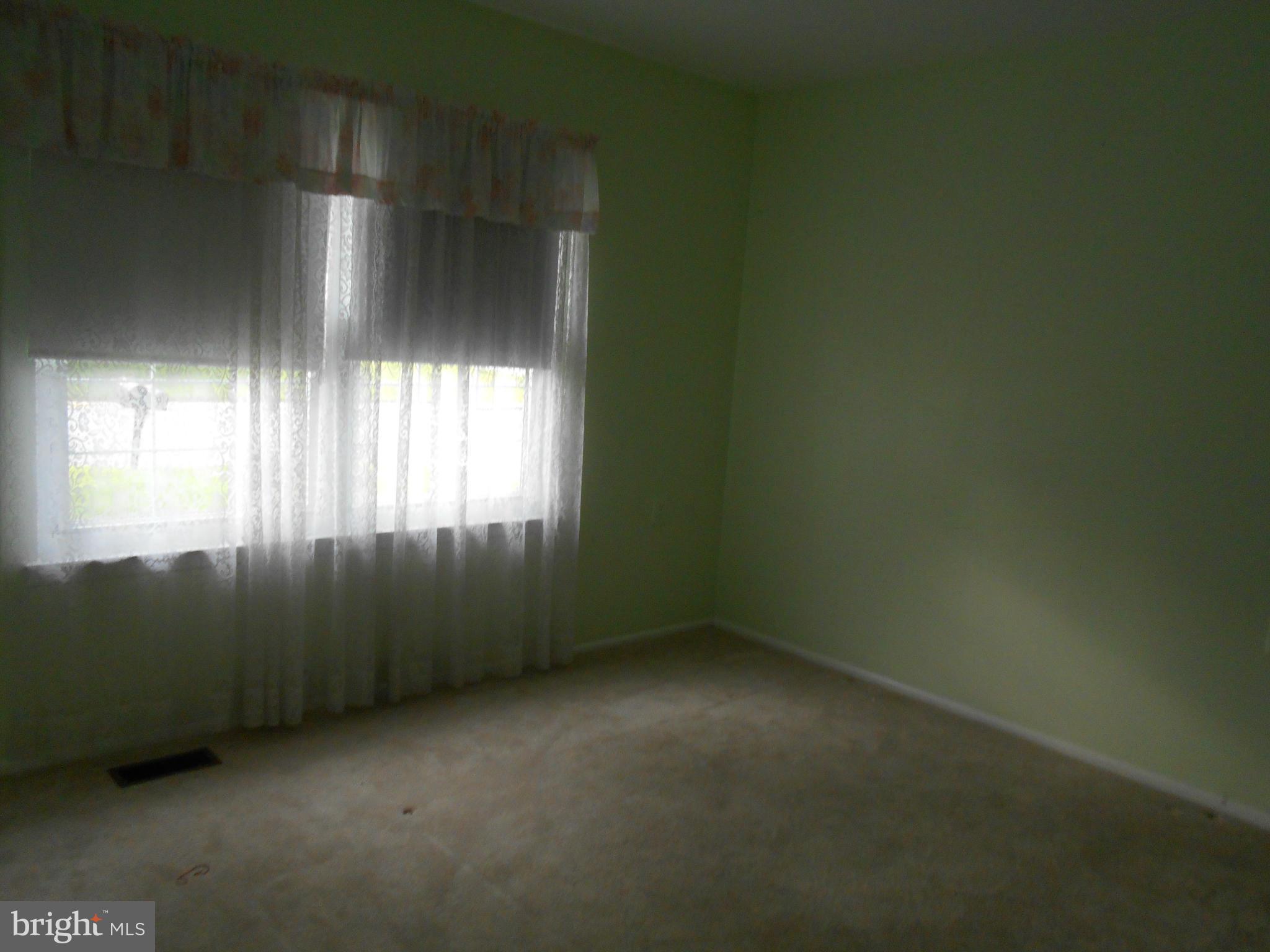 7048 Catalpa Road Frederick, MD 21703 - Photo 14 of 26 an empty room with a window
