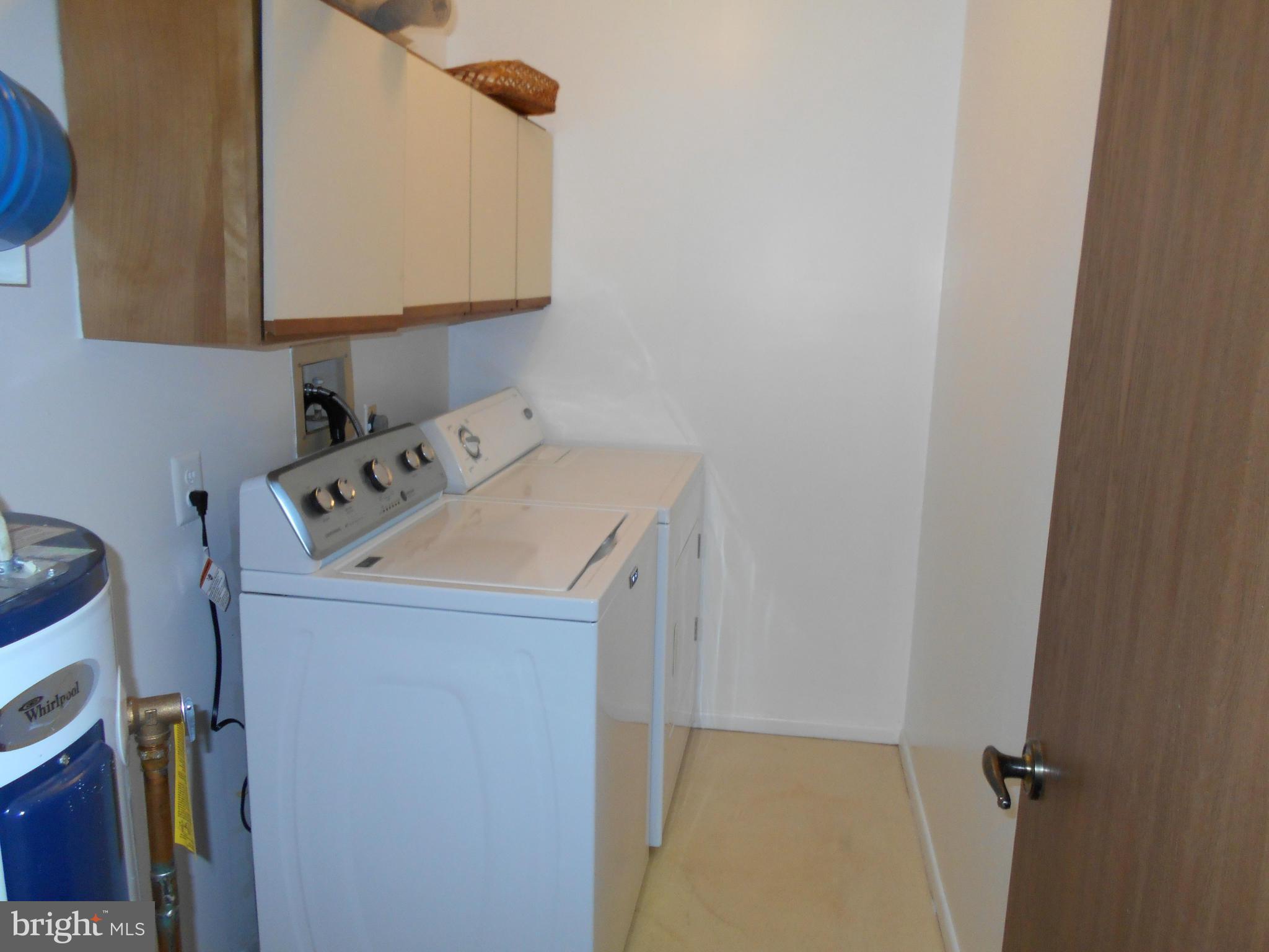 7048 Catalpa Road Frederick, MD 21703 - Photo 18 of 26 a utility room with dryer and washer