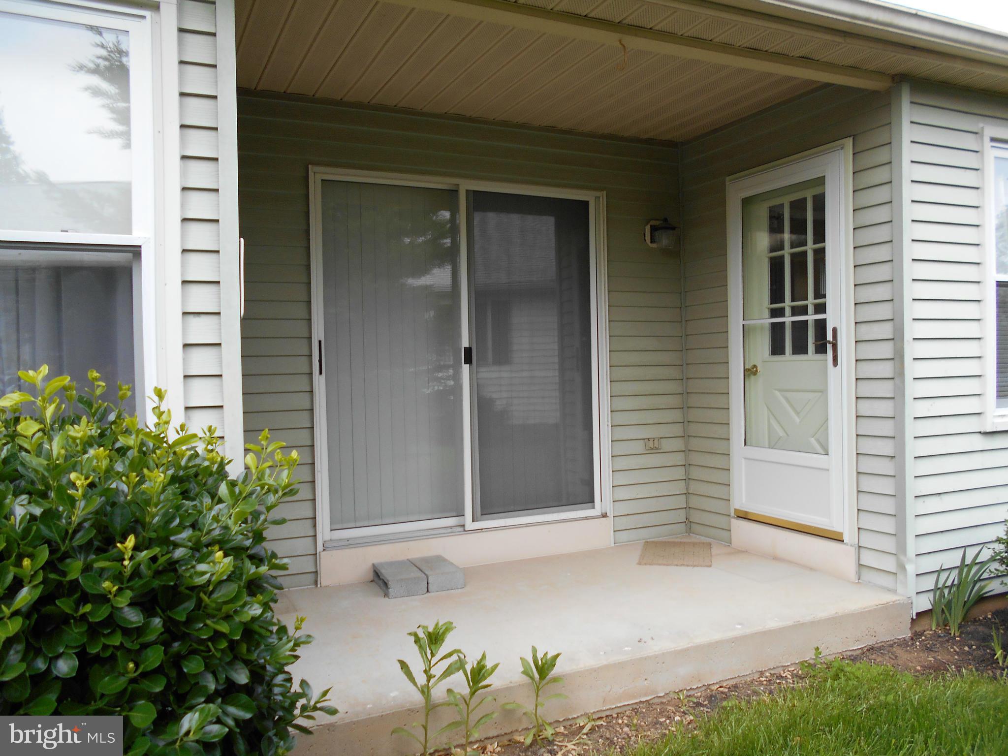 7048 Catalpa Road Frederick, MD 21703 - Photo 23 of 26 a view of front door of house
