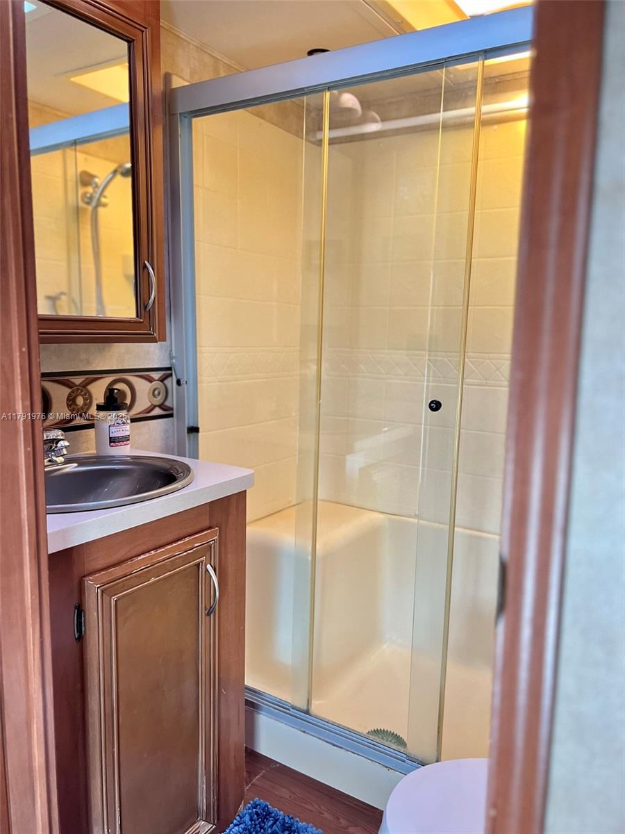 325 Calusa Street Key Largo, FL 33037 - Photo 20 of 48 a bathroom with a shower and a sink