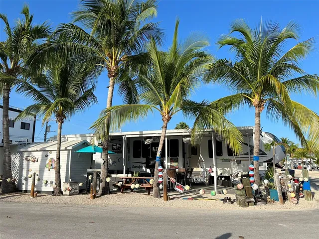 a view of street with sitting area