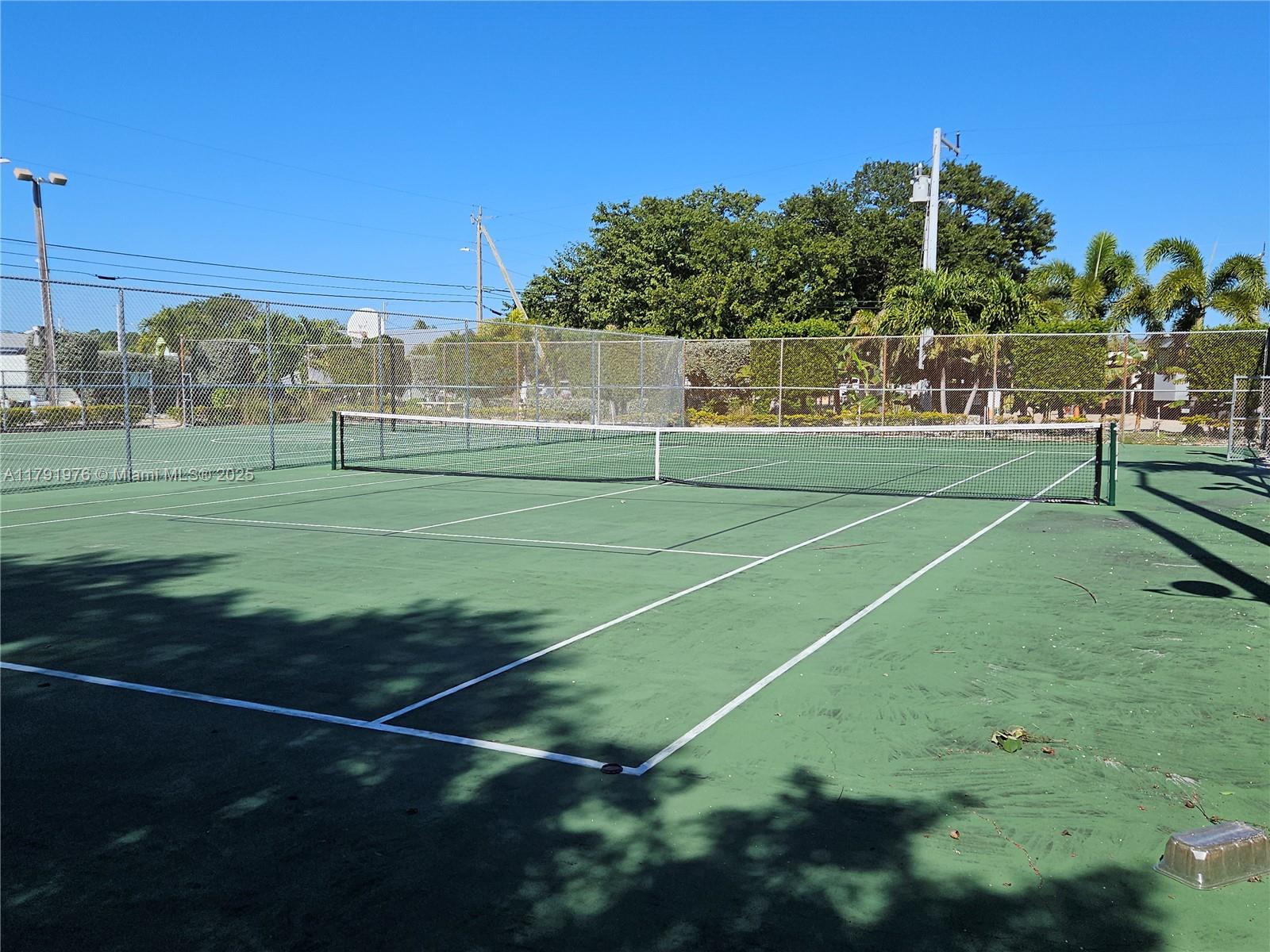 325 Calusa Street Key Largo, FL 33037 - Photo 39 of 48 a view of a tennis ground