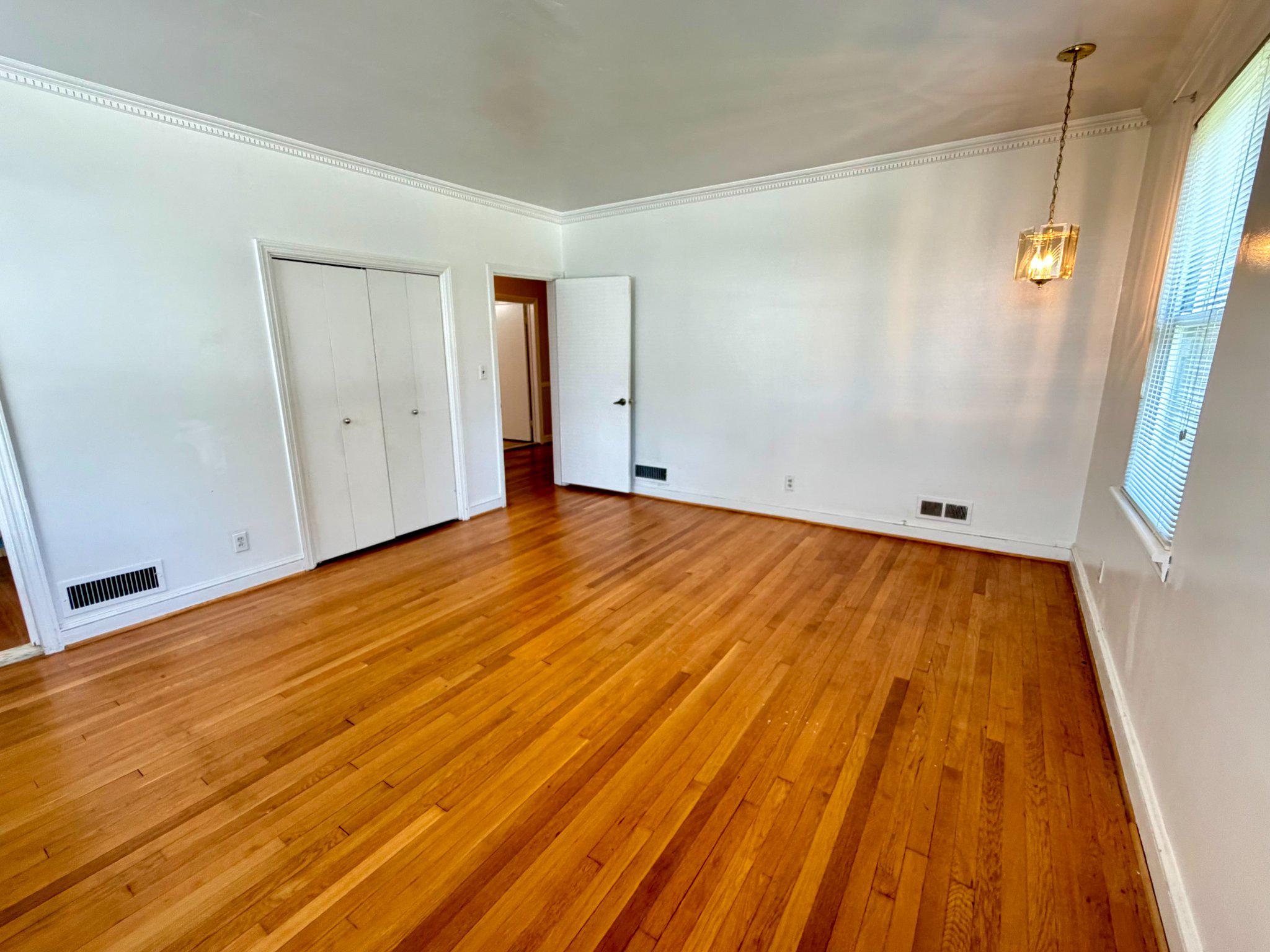 6318 Winner Avenue Baltimore, MD 21215 - Photo 36 of 75 a view of empty room with wooden floor