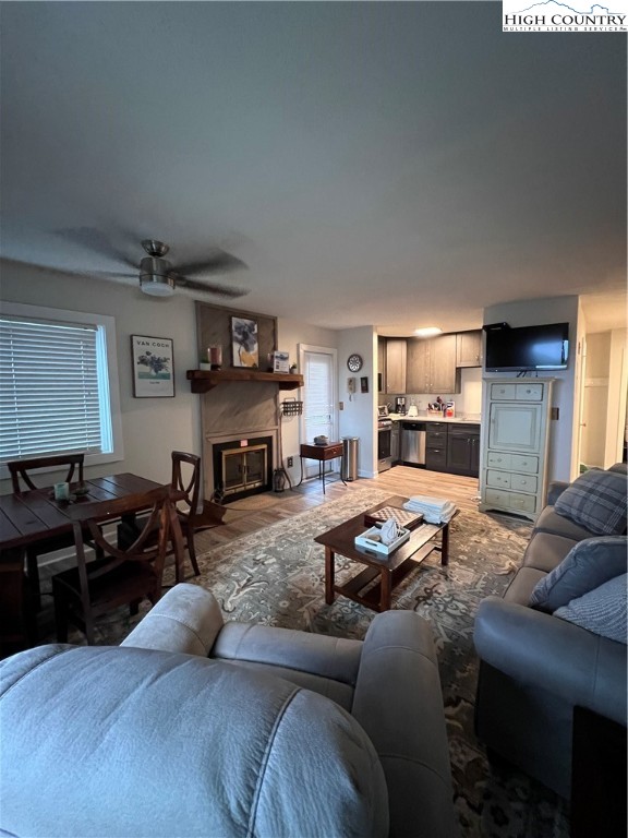 301 Pinnacle Inn Road, Unit 4116 Beech Mountain, NC 28604 - Photo 1 of 16 a living room with furniture and a fireplace