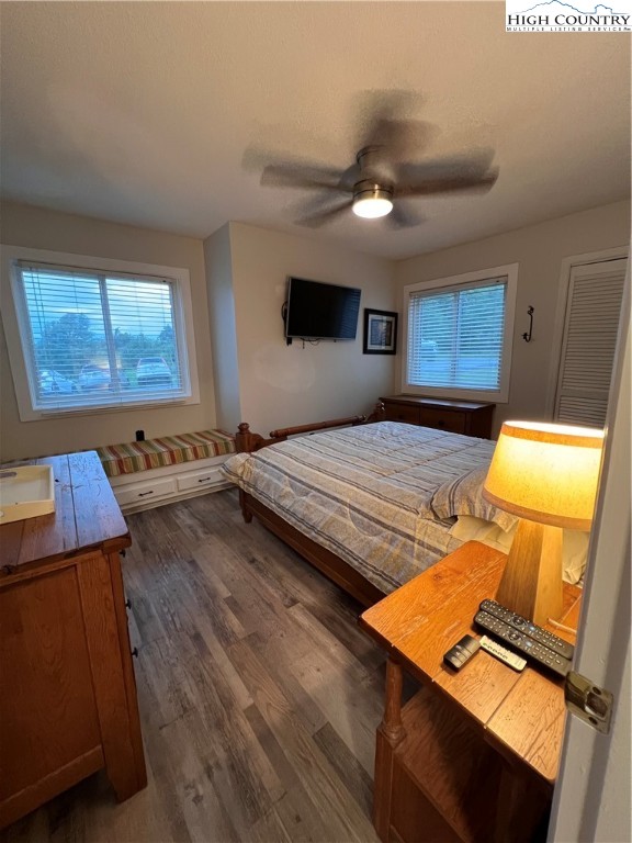 301 Pinnacle Inn Road, Unit 4116 Beech Mountain, NC 28604 - Photo 11 of 16 a bedroom with a bed and wooden floor