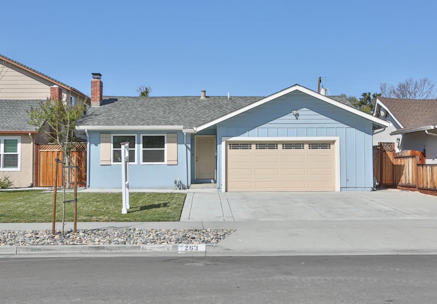 263 Bieber Drive San Jose, CA 95123 - Photo 1 of 26 a front view of a house with a garden