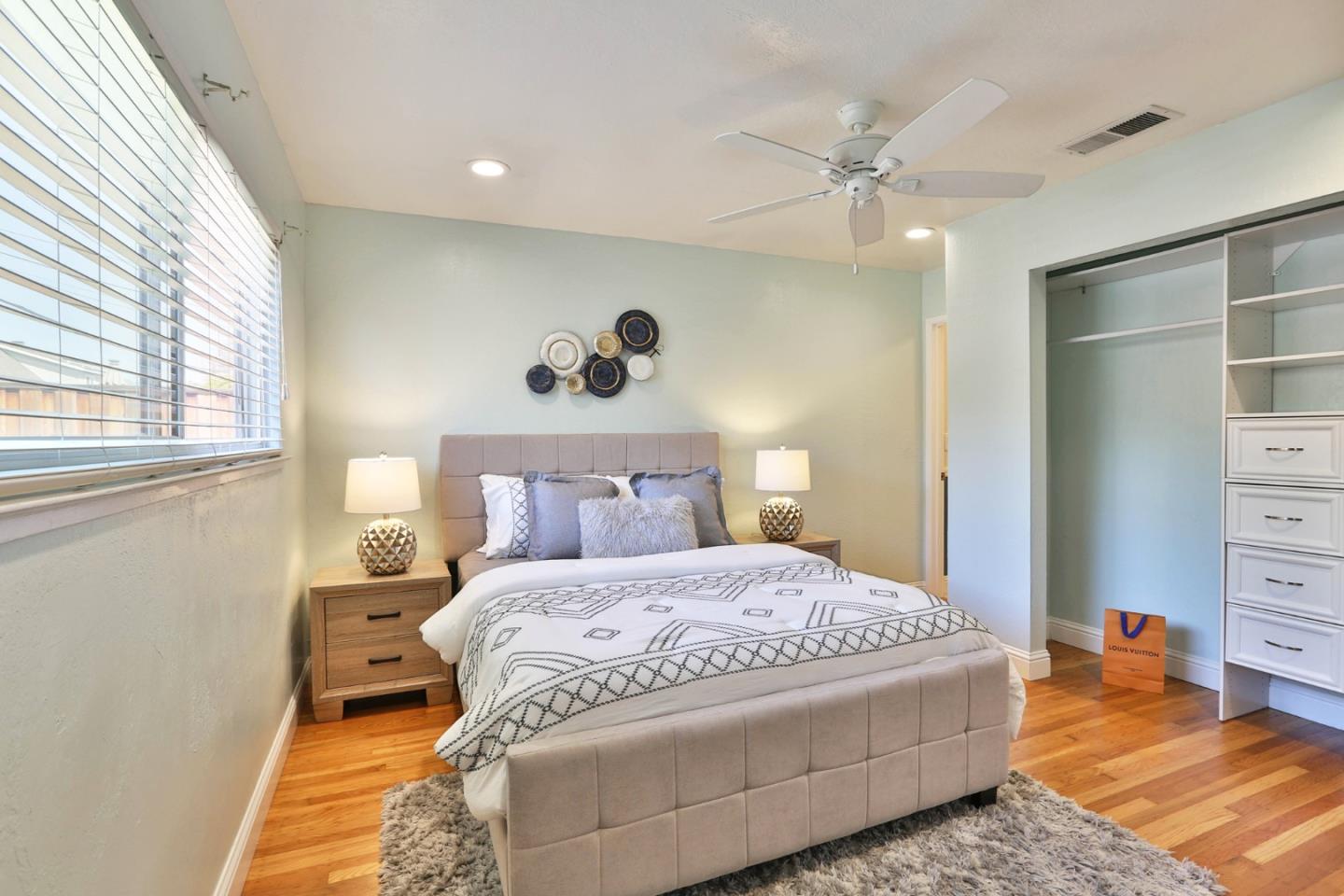 263 Bieber Drive San Jose, CA 95123 - Photo 16 of 26 a bedroom with a bed and a cabinets