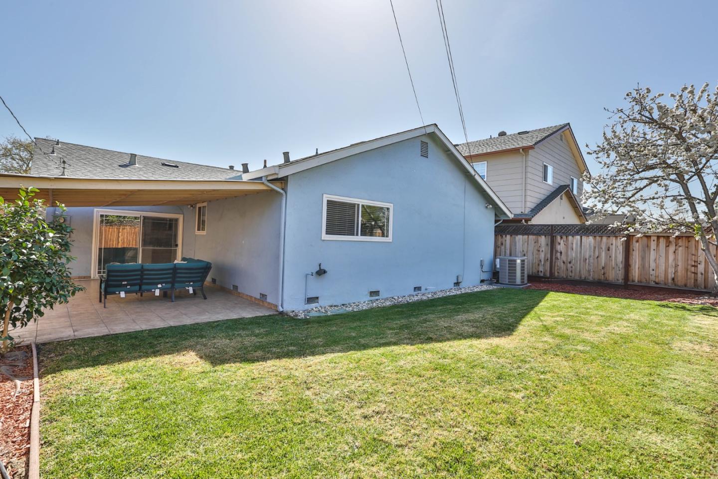 263 Bieber Drive San Jose, CA 95123 - Photo 22 of 26 a backyard of a house with table and chairs