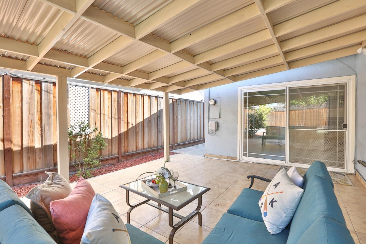 263 Bieber Drive San Jose, CA 95123 - Photo 24 of 26 a living room with furniture and a floor to ceiling window