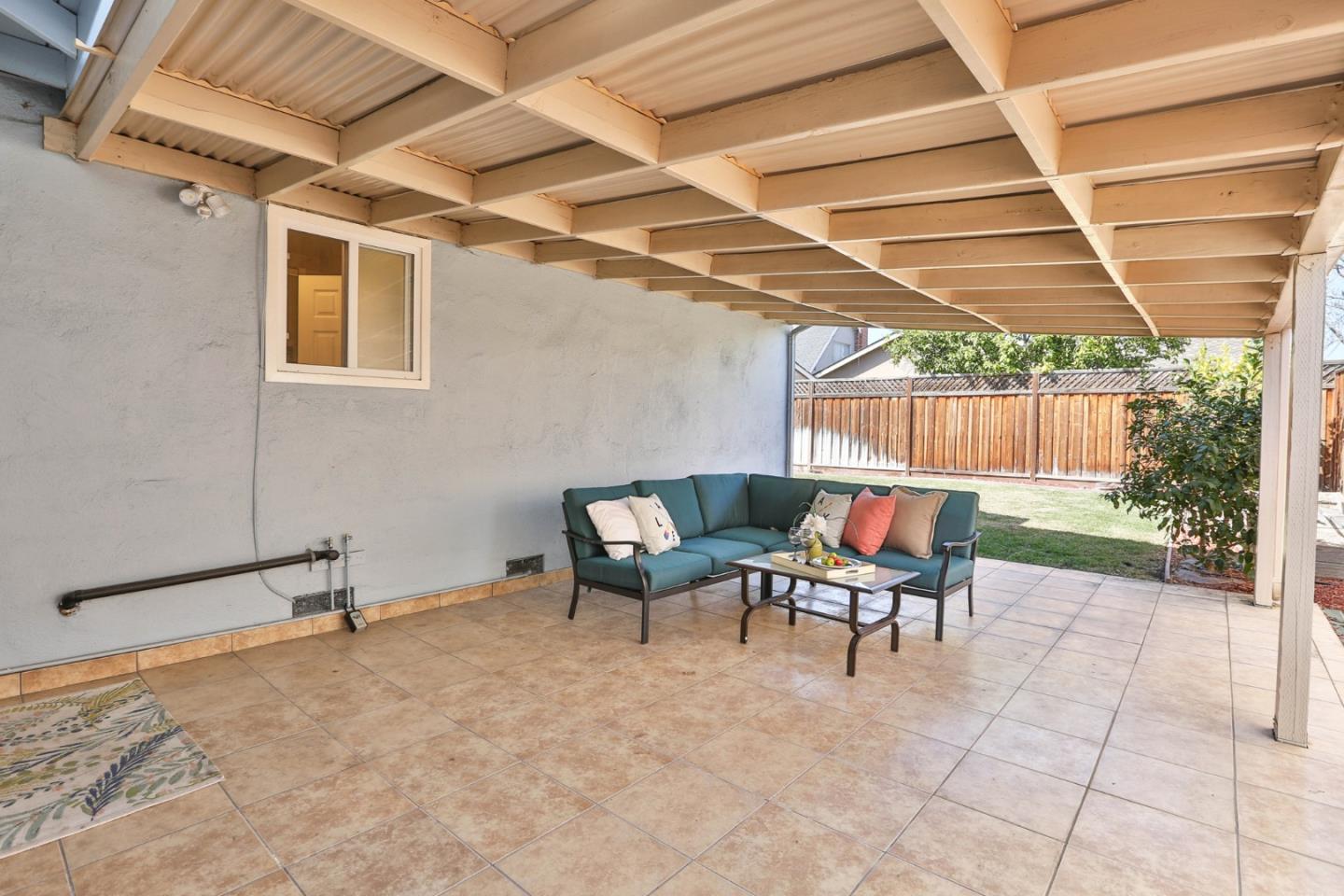 263 Bieber Drive San Jose, CA 95123 - Photo 26 of 26 a view of a patio with table and chairs and potted plants