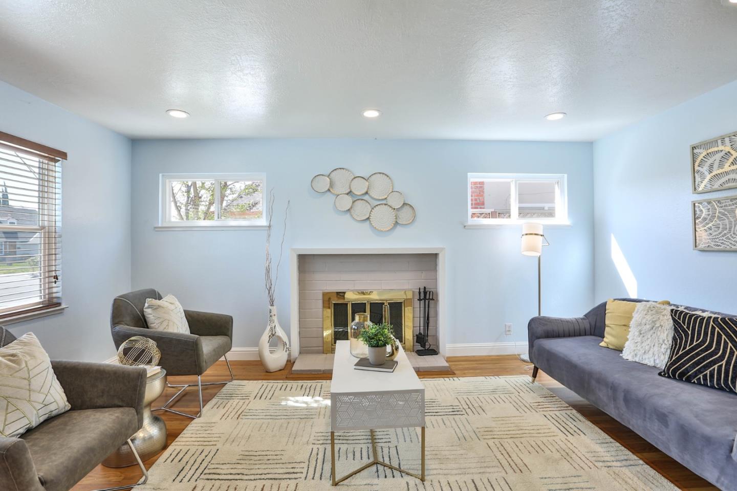 263 Bieber Drive San Jose, CA 95123 - Photo 3 of 26 a living room with furniture and a fireplace