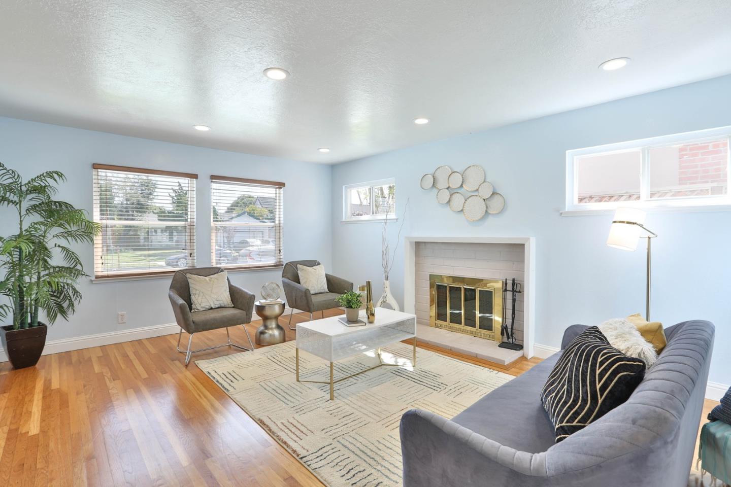 263 Bieber Drive San Jose, CA 95123 - Photo 5 of 26 a living room with furniture and a fireplace
