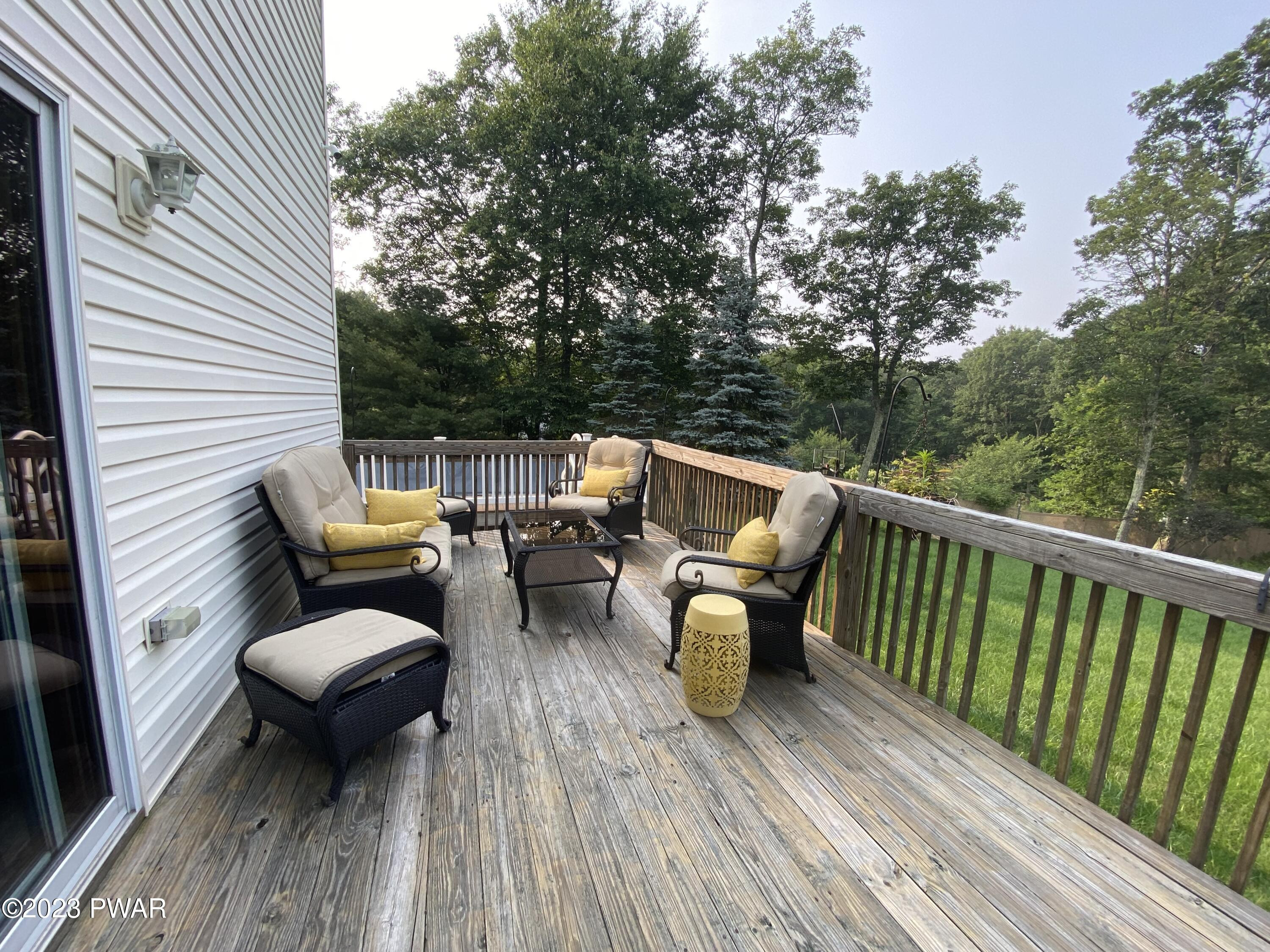 126 Maple Ridge Road Milford, PA 18337 - Photo 11 of 52 a view of a patio on the roof deck