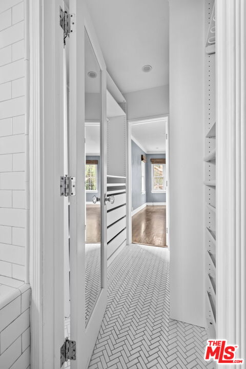 1307 South Rimpau Boulevard Los Angeles, CA 90019 - Photo 16 of 22 a bathroom with a bathtub and shower