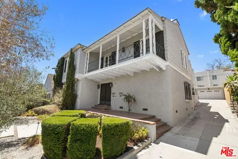 a front view of house with yard