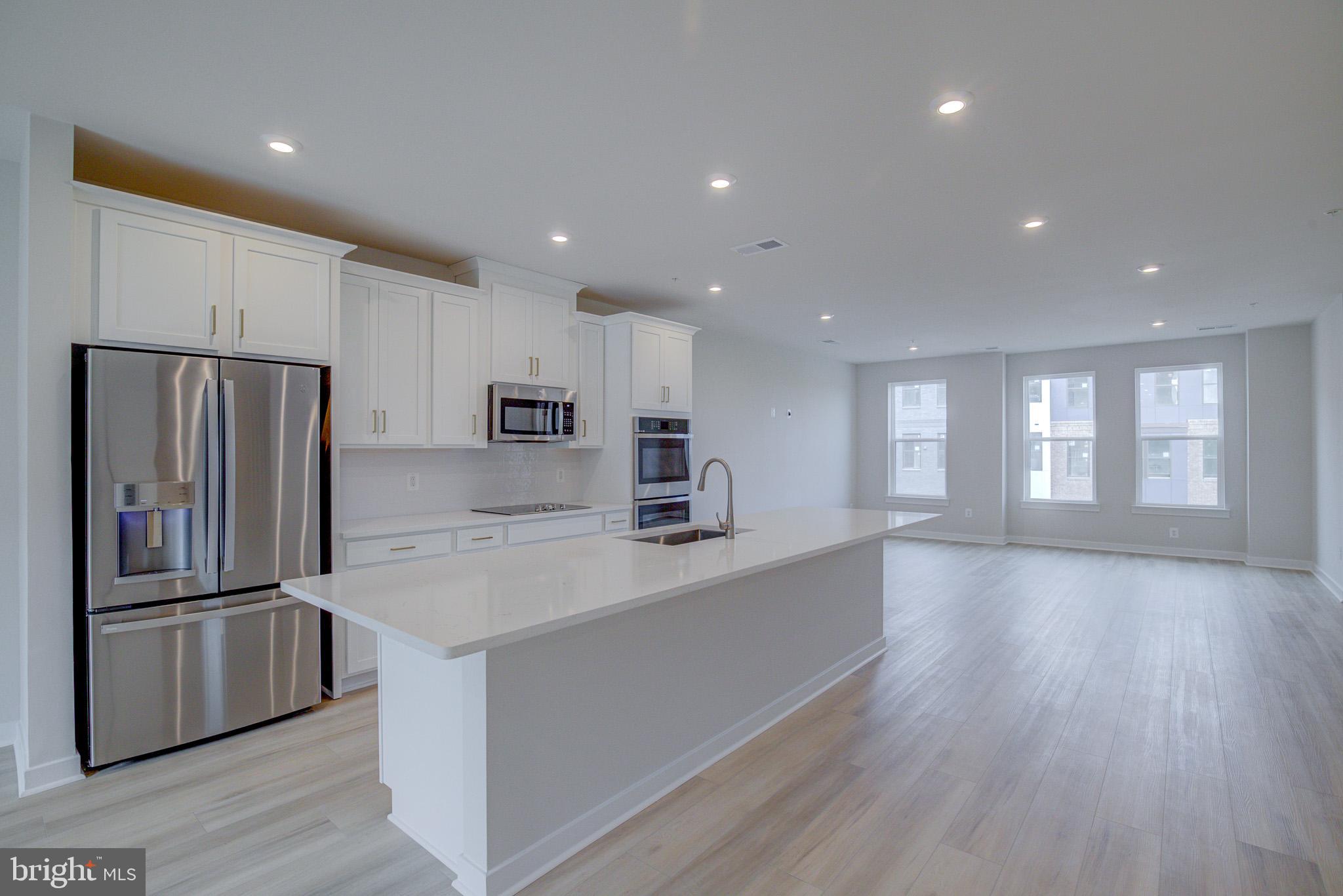 14138 Gypsum Loop Chantilly, VA 20151 - Photo 5 of 36 Gourmet Kitchen w/ Huge Island & SS Appliances