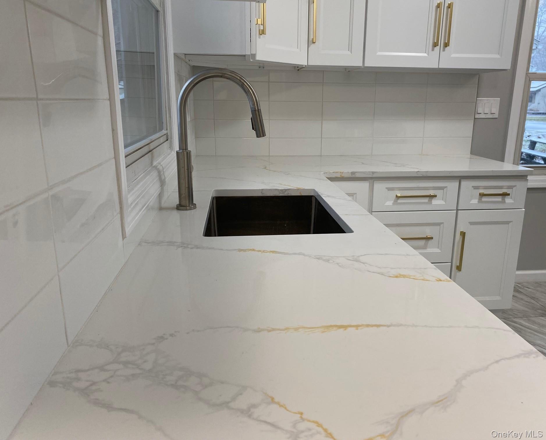 5 Smith Road Cornwall, NY 12518 - Photo 10 of 33 a kitchen with a sink and cabinets