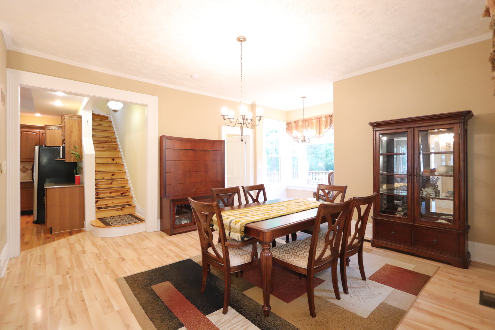 835 East Southmor Road Morris, IL 60450 - Photo 22 of 71 a view of a dining room with furniture and wooden floor