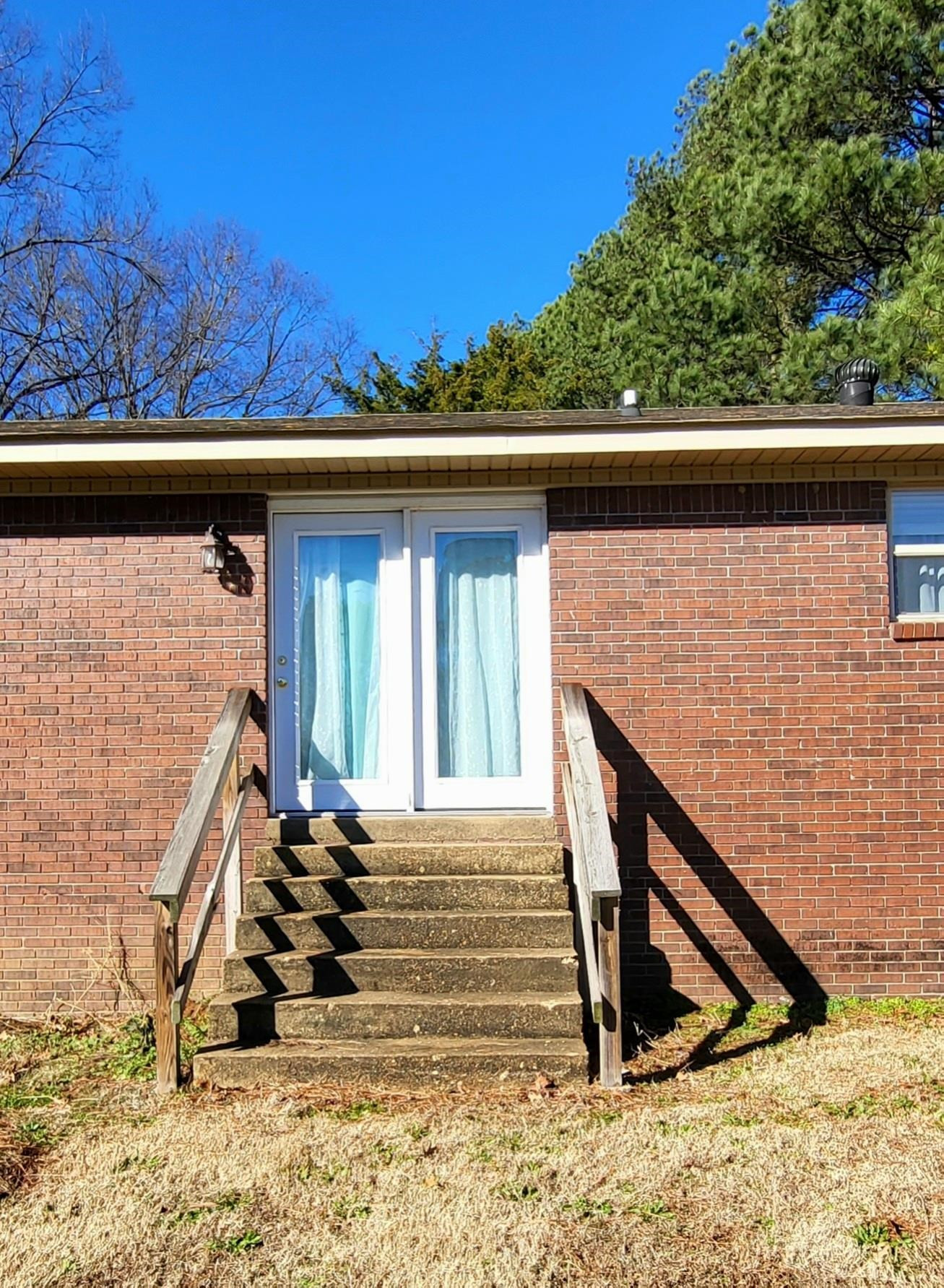 2158 Barlow Road Ripley, TN 38063 - Photo 5 of 19 a view of a house with a backyard