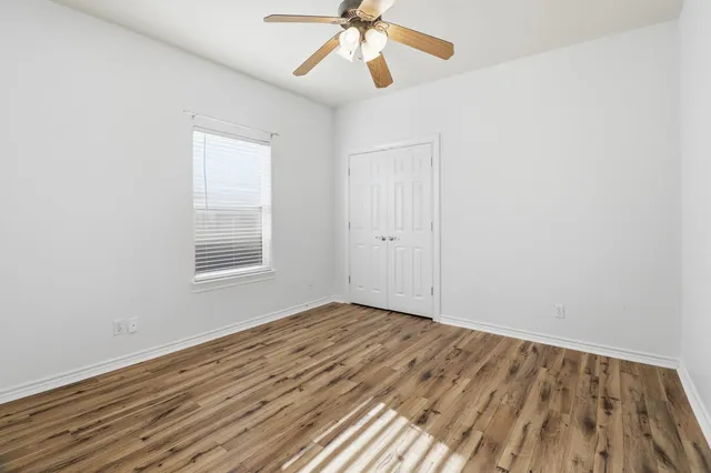 a bathroom with a sink toilet and vanity