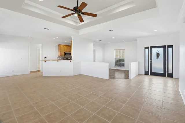 a view of a kitchen with furniture and a kitchen