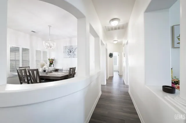 a view of a living room and dining room