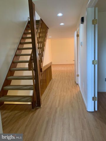 a view of entryway with wooden floor