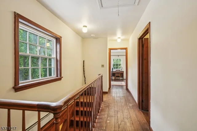 a bedroom with a bed and a fireplace