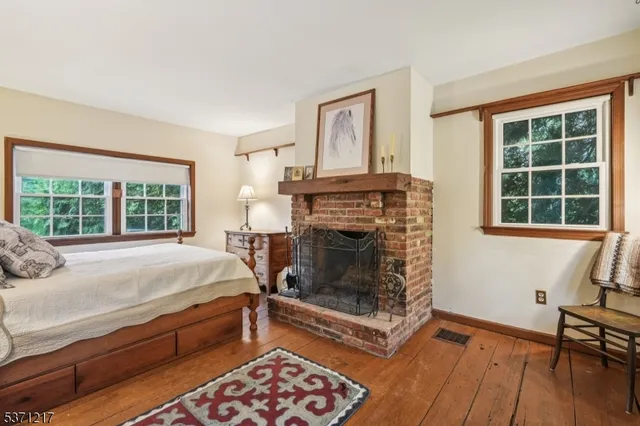 a view of a hallway with a room