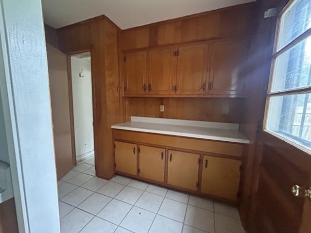 1917 Finley Road Memphis, TN 38116 - Photo 8 of 16 Wood-paneled wall with built-in cabinetry and countertop space