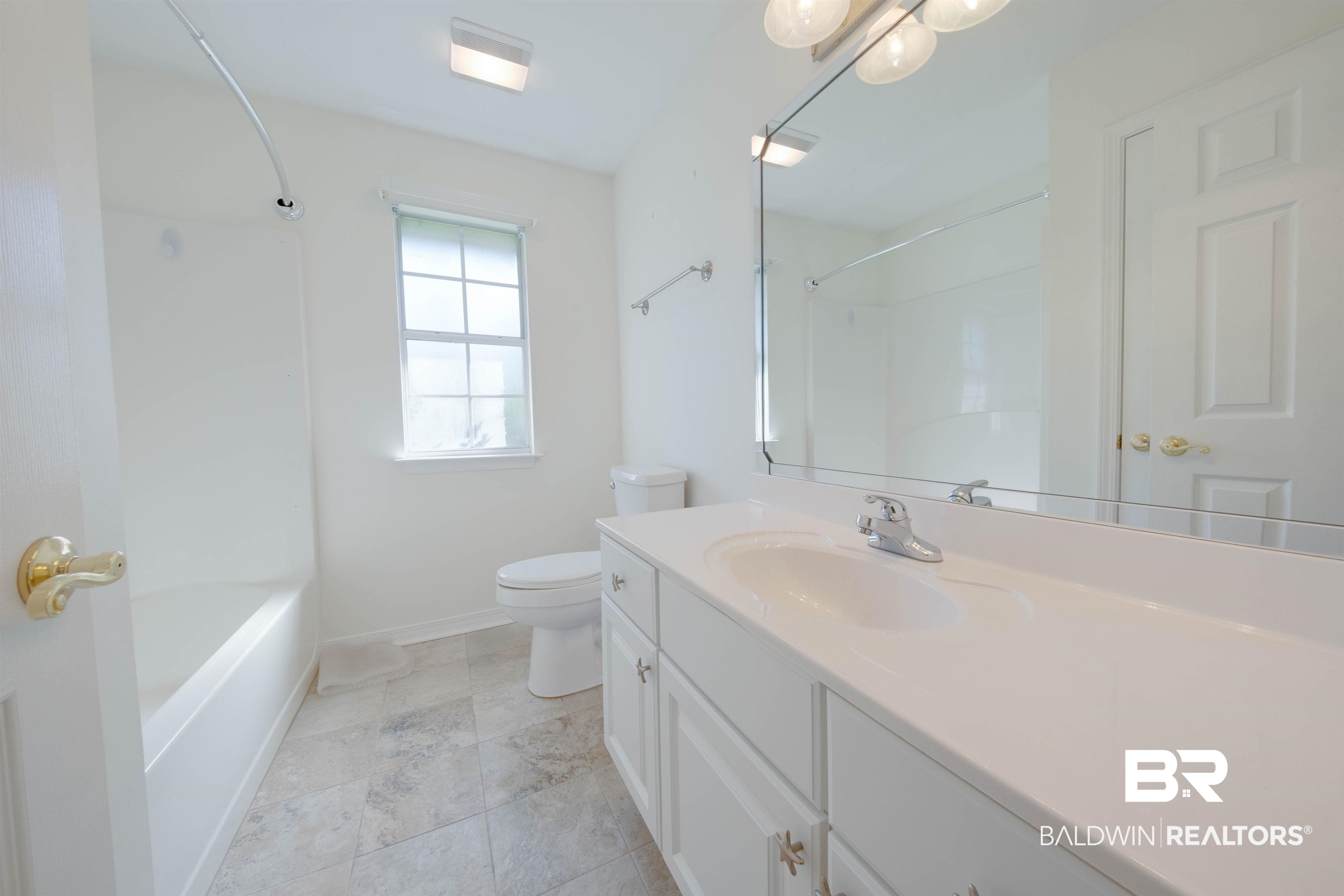 9462 Lakeview Drive Foley, AL 36535 - Photo 42 of 50 Full bathroom with vanity, toilet, and bathtub / shower combination