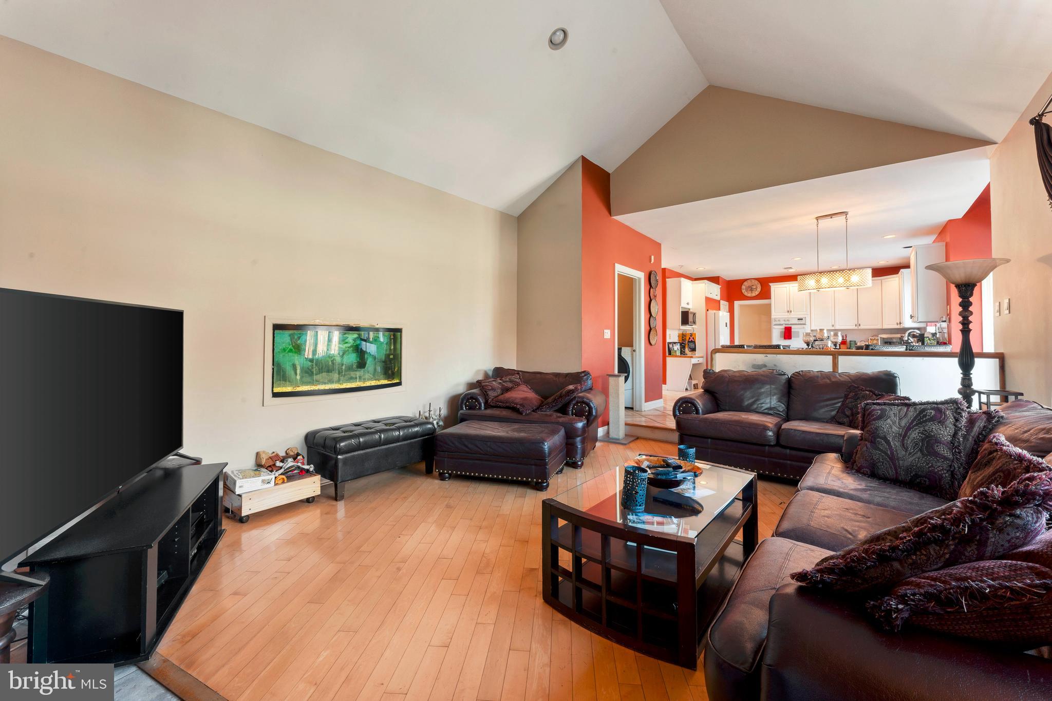 67 Lenape Road Richboro, PA 18954 - Photo 16 of 43 a living room with furniture and a flat screen tv